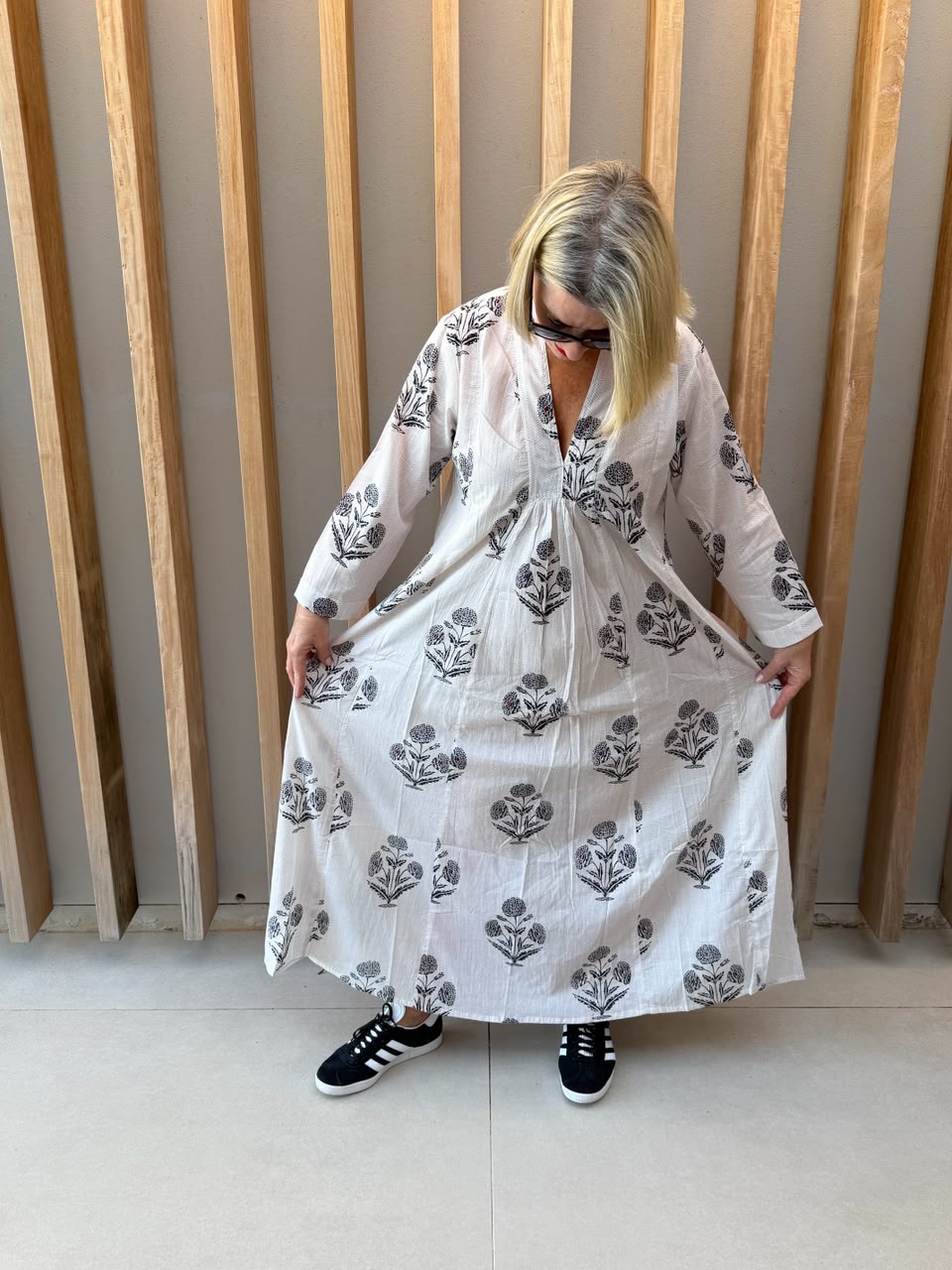 White dress with black daisy floral pattern