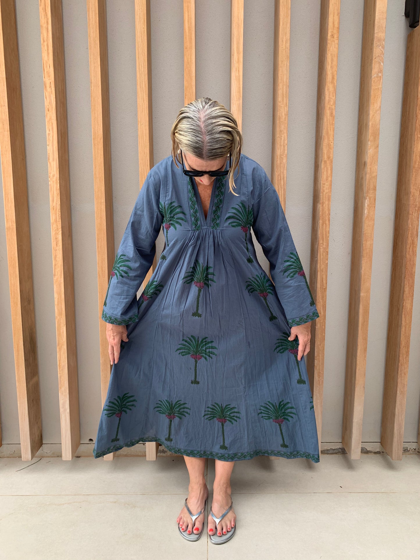 Blue dress with green palm floral pattern