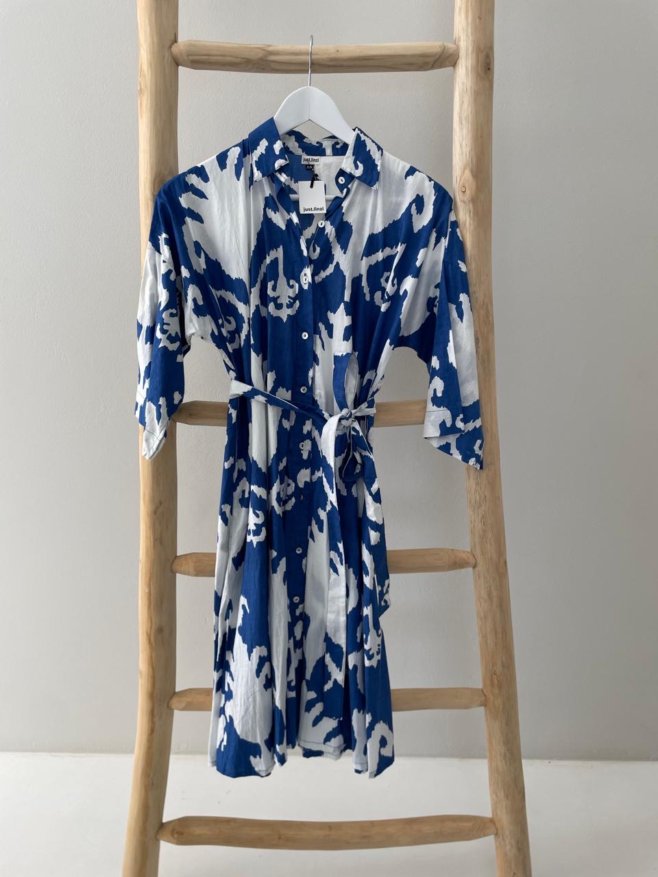 Blue dress with white floral pattern collar