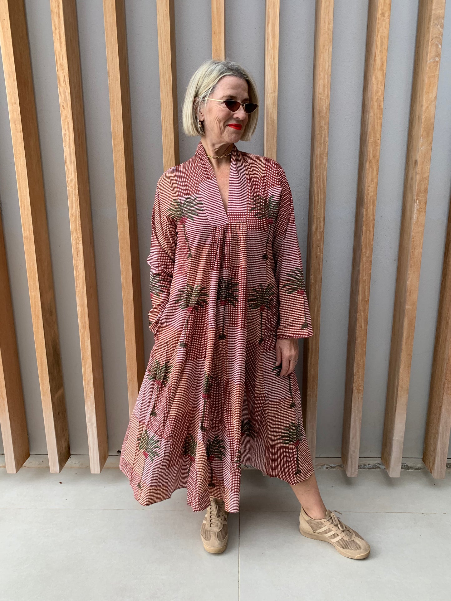 Orange & brick coloured fine checked dress with green palm pattern