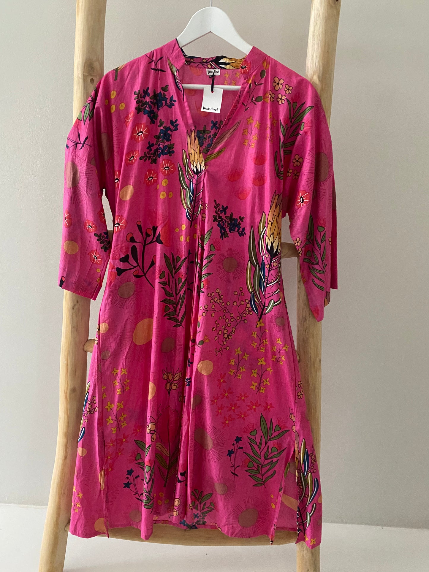 Bright pink protea floral dress