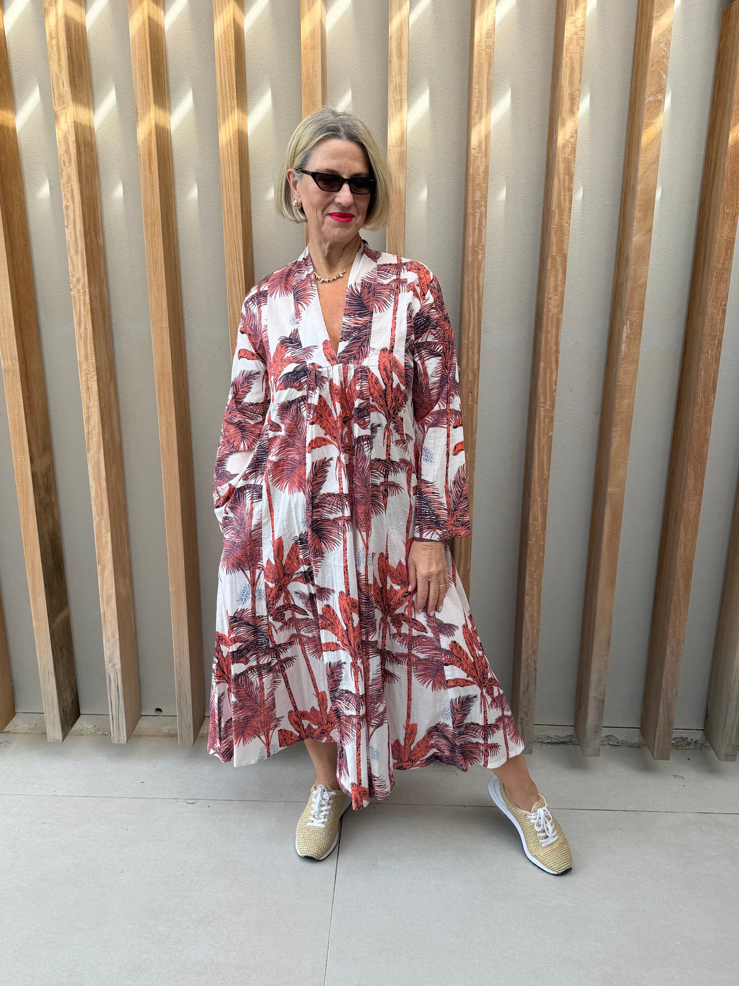 White dress with burned orange palm pattern