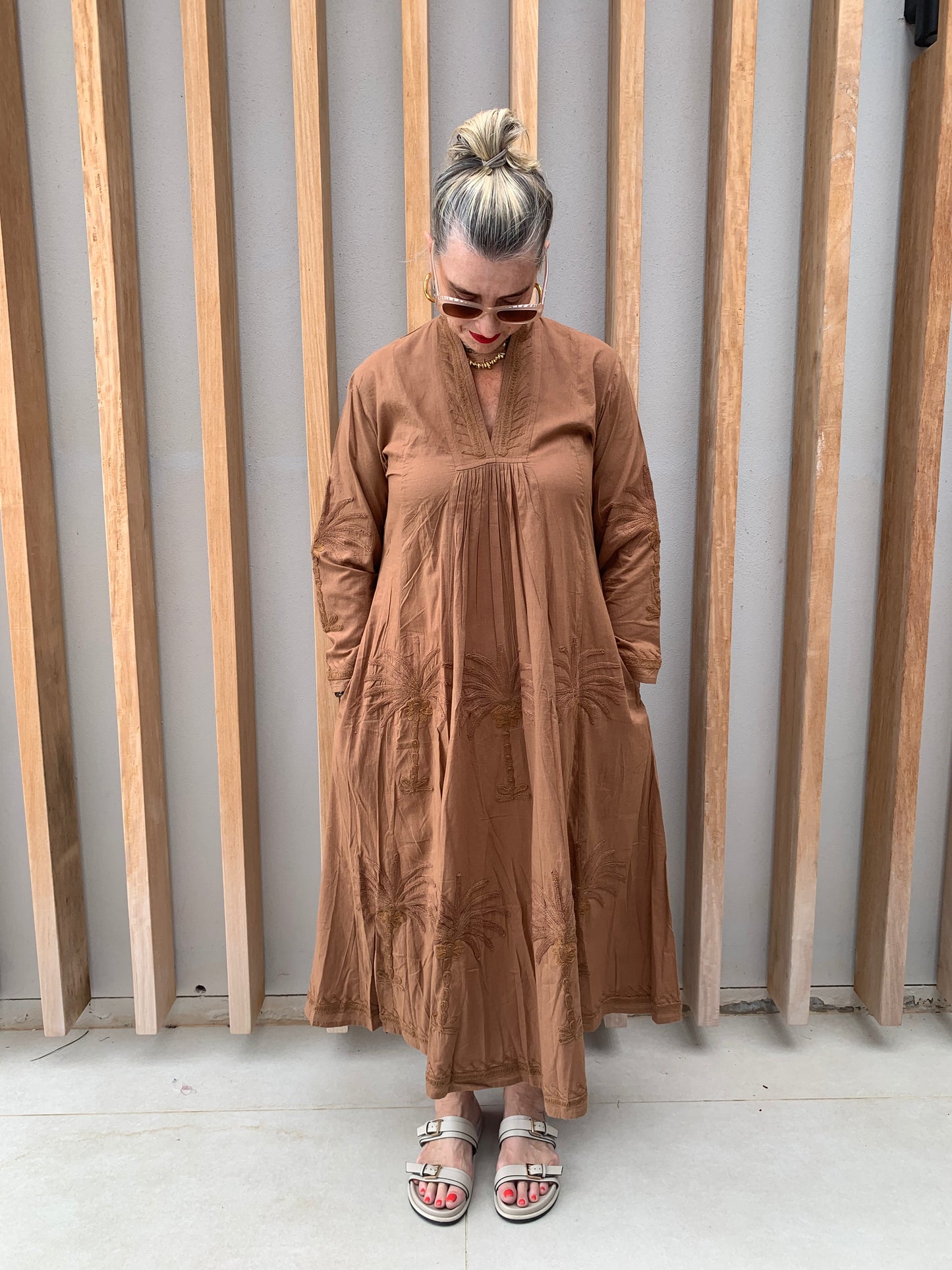 Caramel dress with embroidered palm pattern