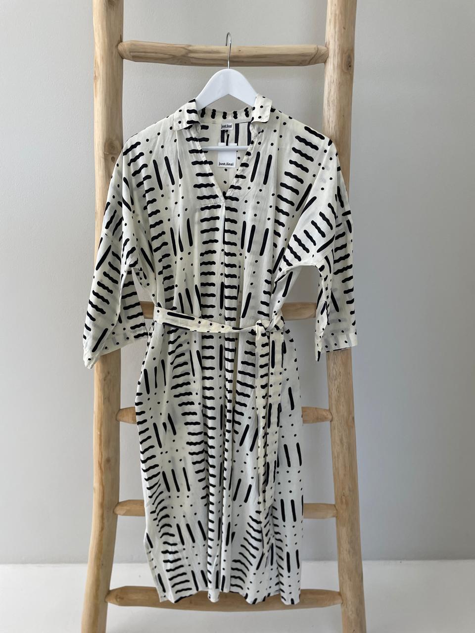 Cream & black dash dress