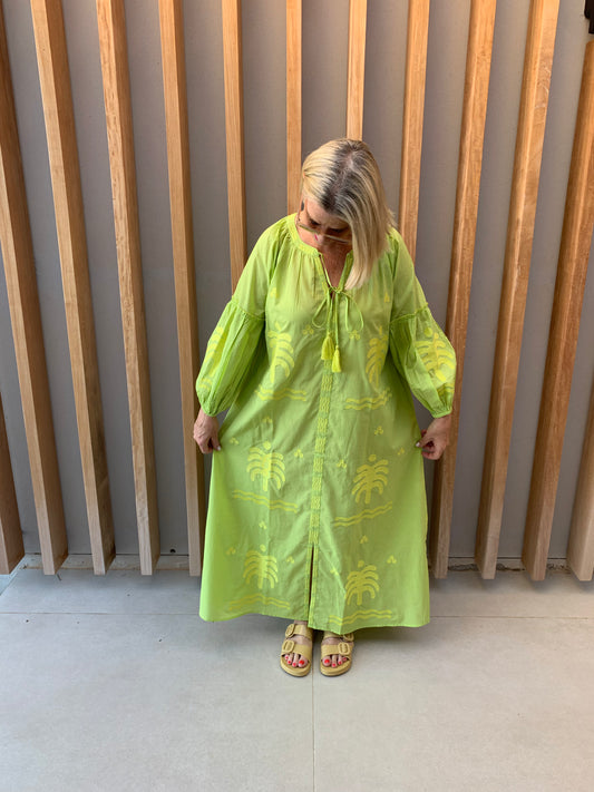 Lime green dress with embroidered palm pattern