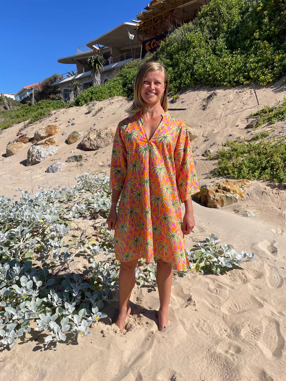 Orange dress with green & pink palm pattern
