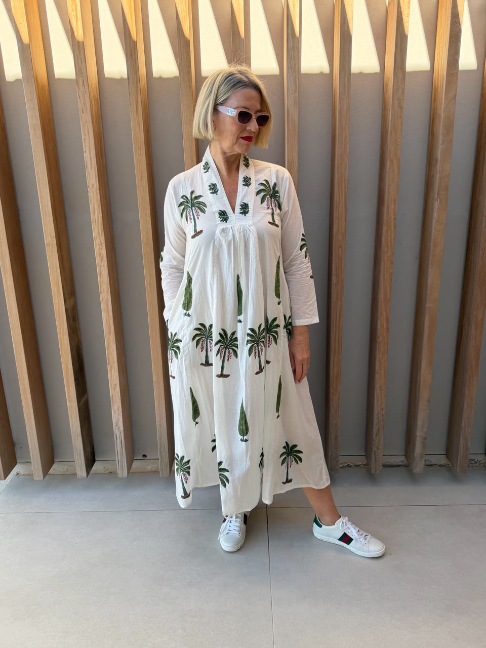 White dress with green palm & conifer pattern