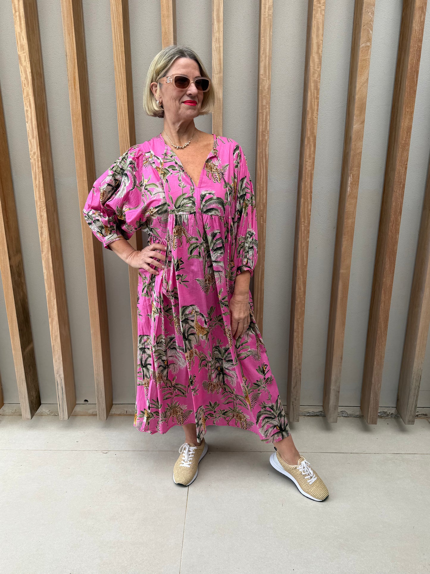 Pink dress with animal palm pattern