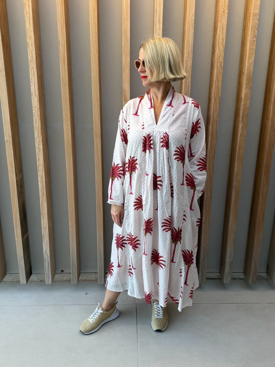 White dress with salmon pink palm pattern
