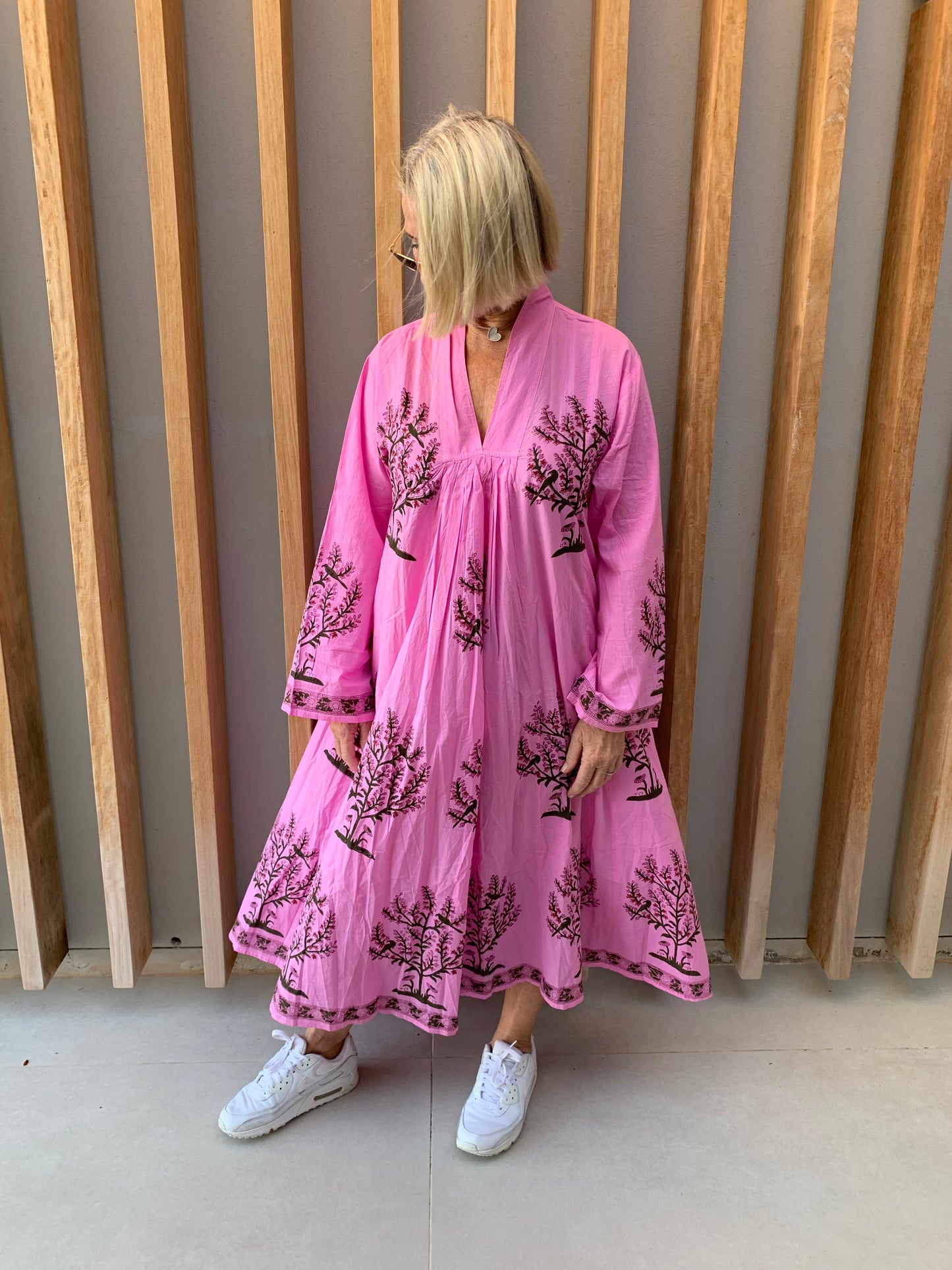 Pink dress with tree blossom pattern
