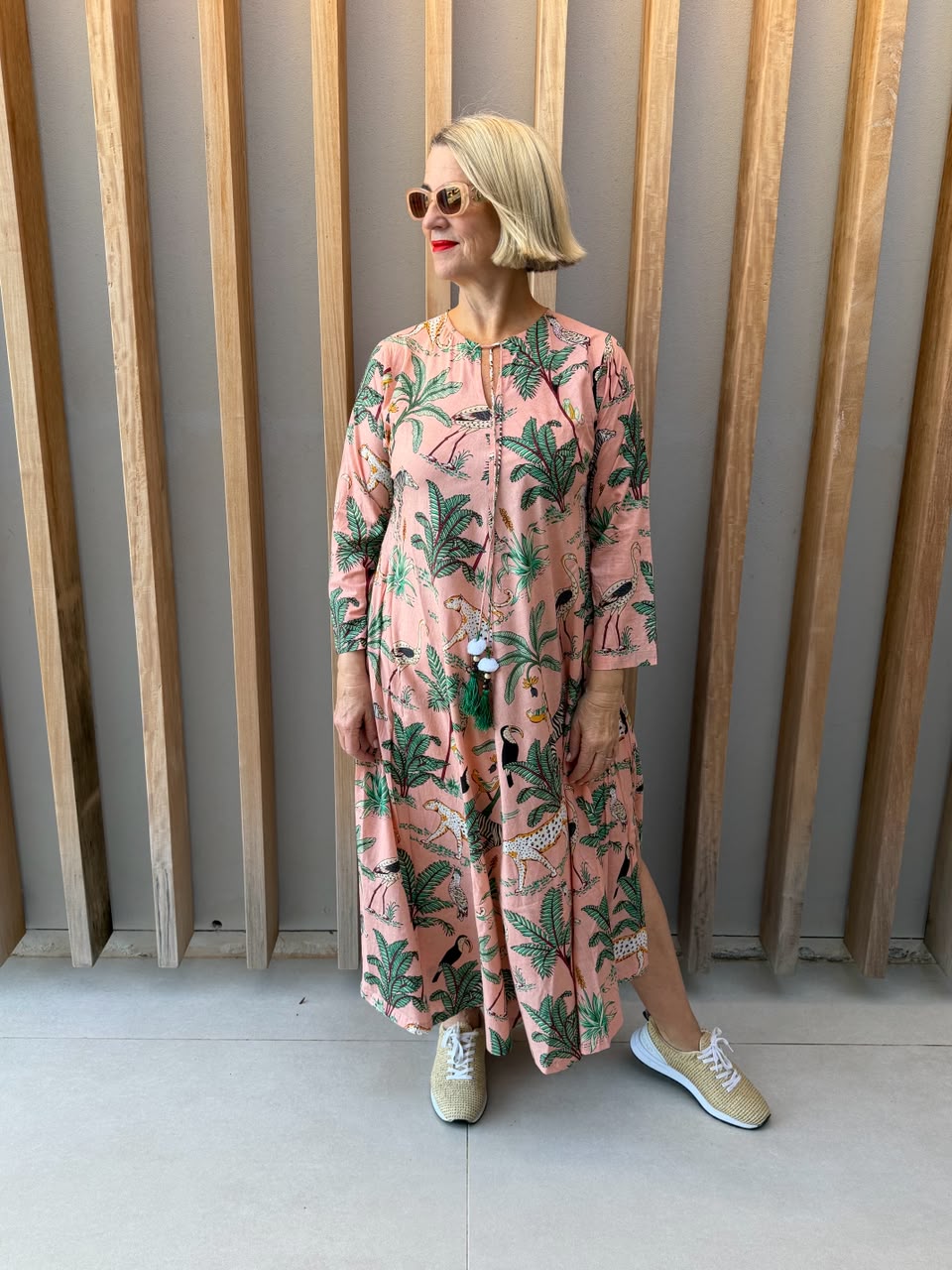 Salmon pink dress with animal palm pattern