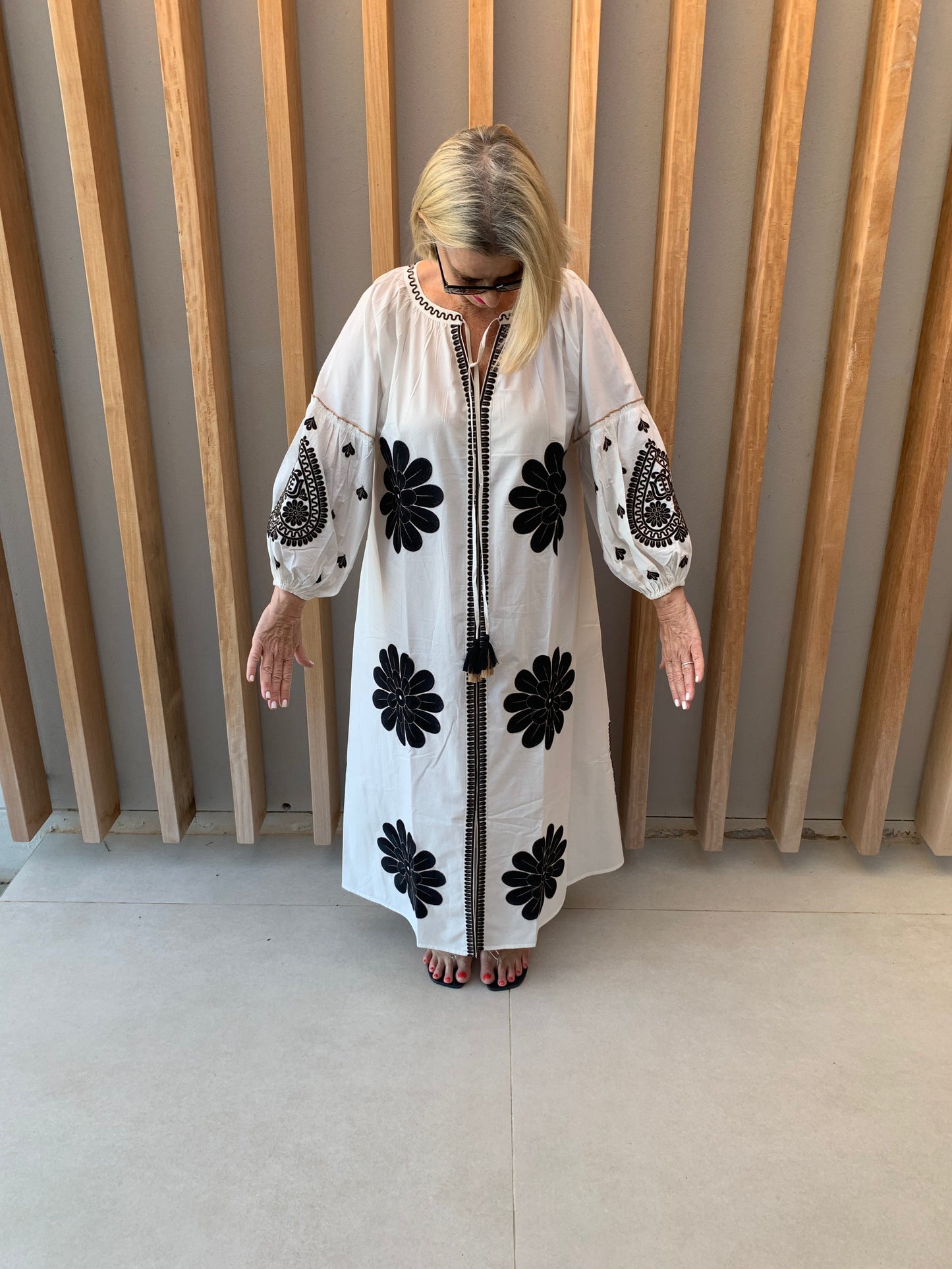 White dress with black geometric pattern