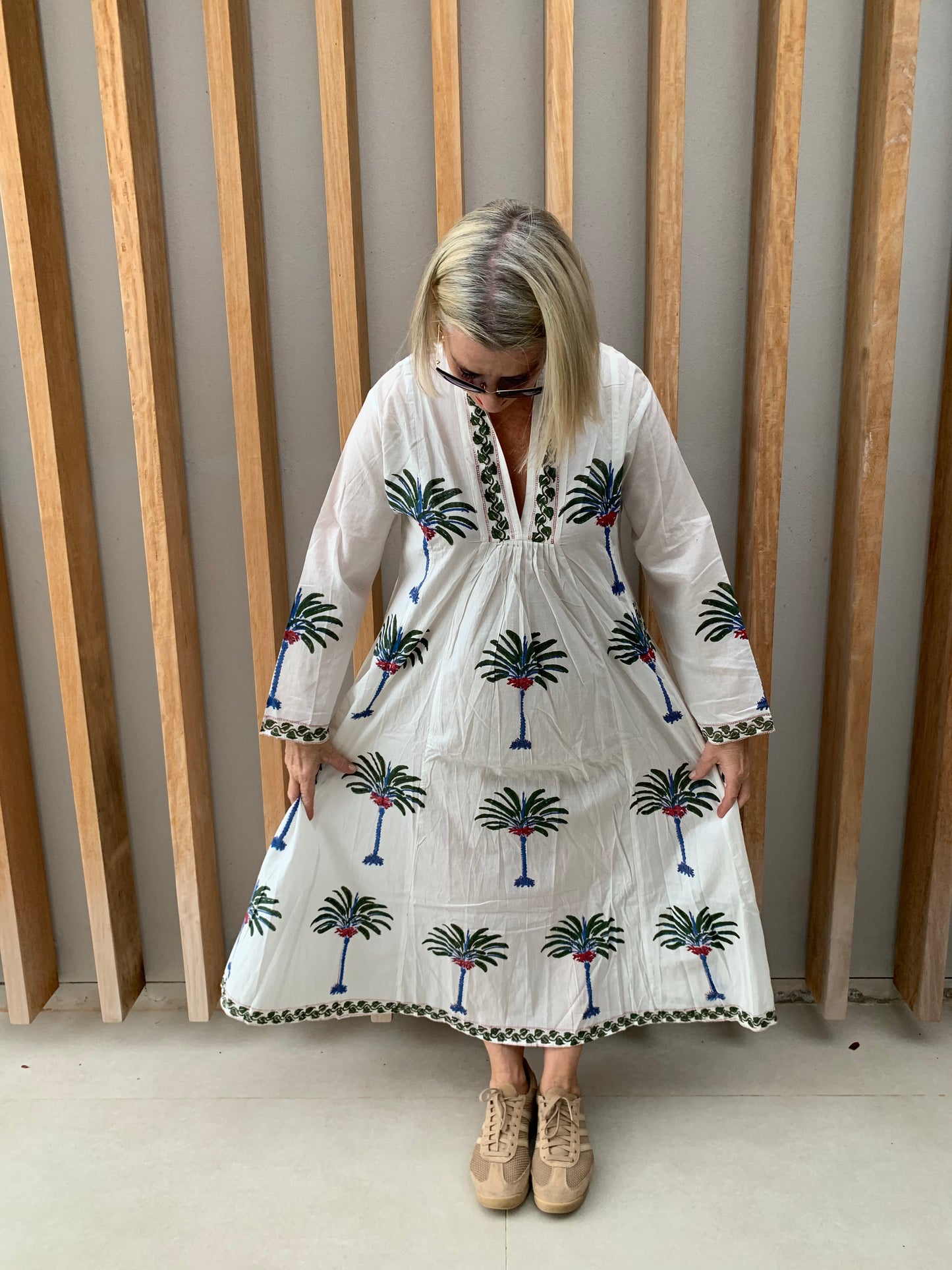 White dress with green & blue palm floral pattern