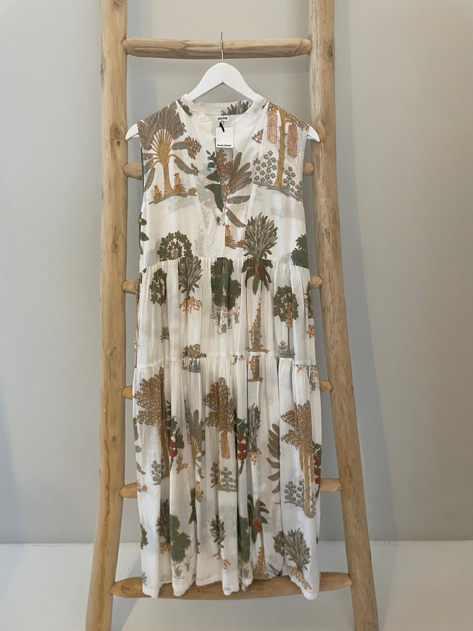 White sleeveless grey fan palm dress