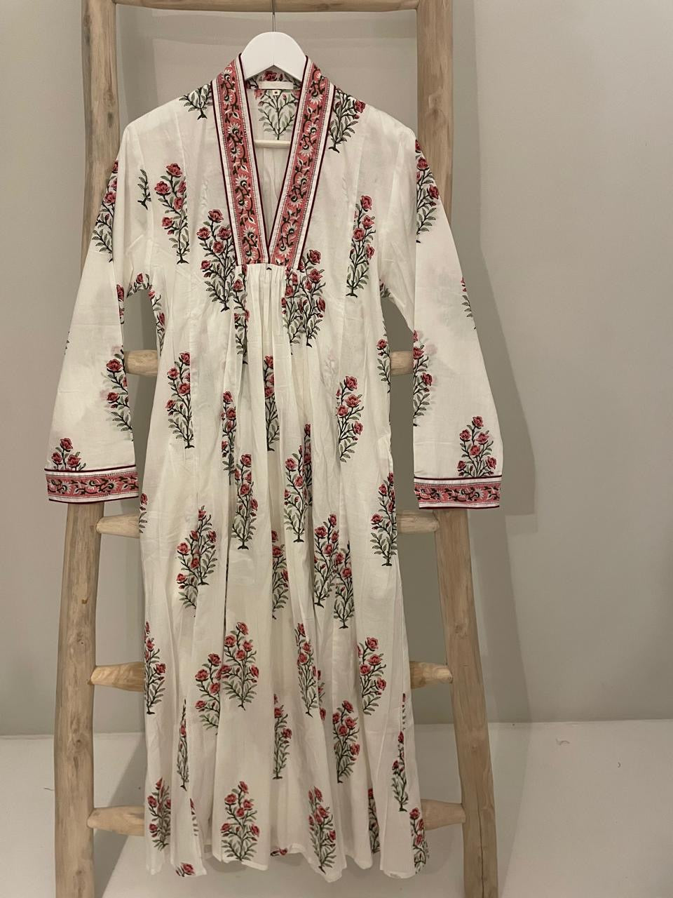 White dress with red roses