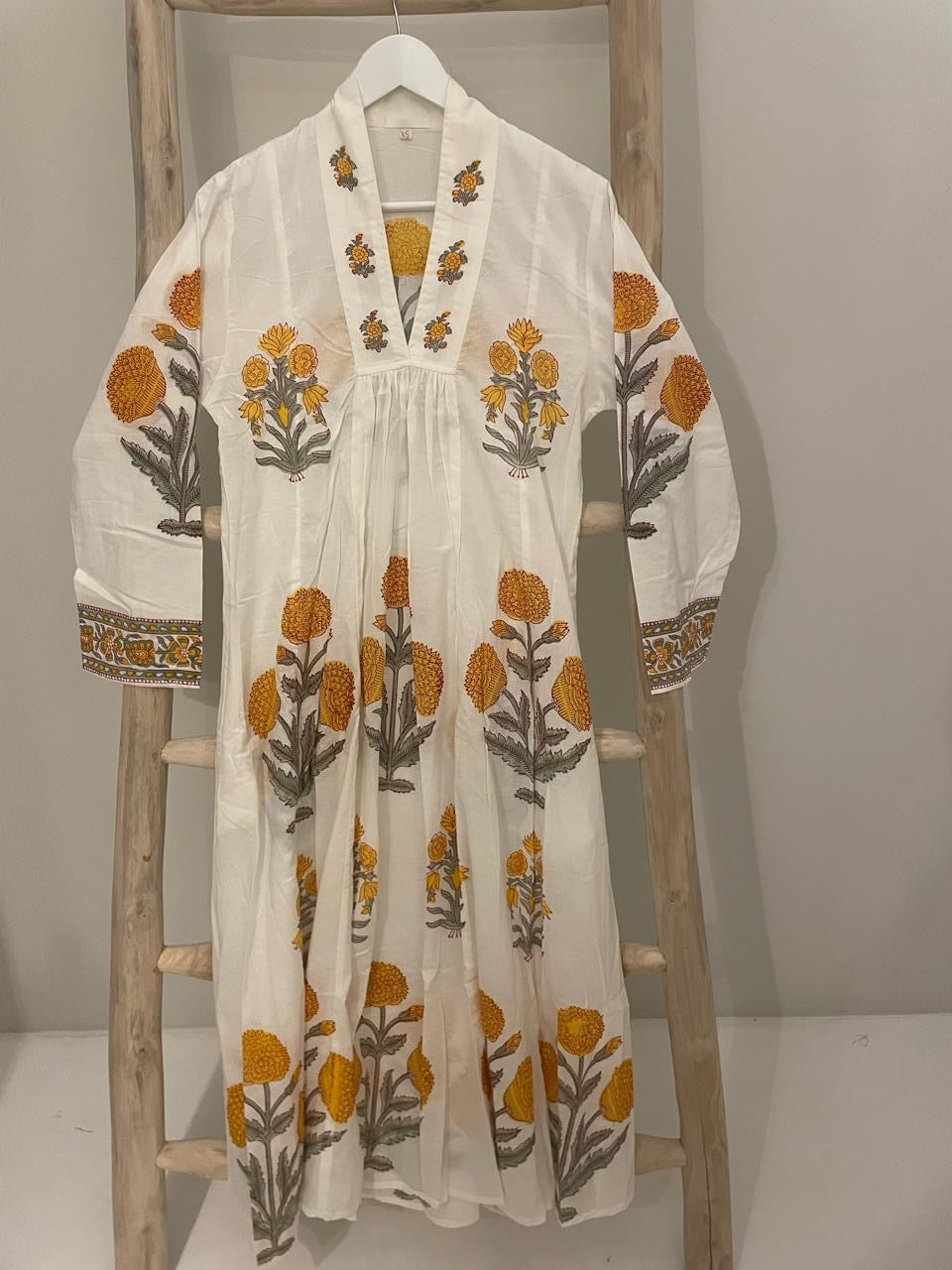 White dress with yellow flowers