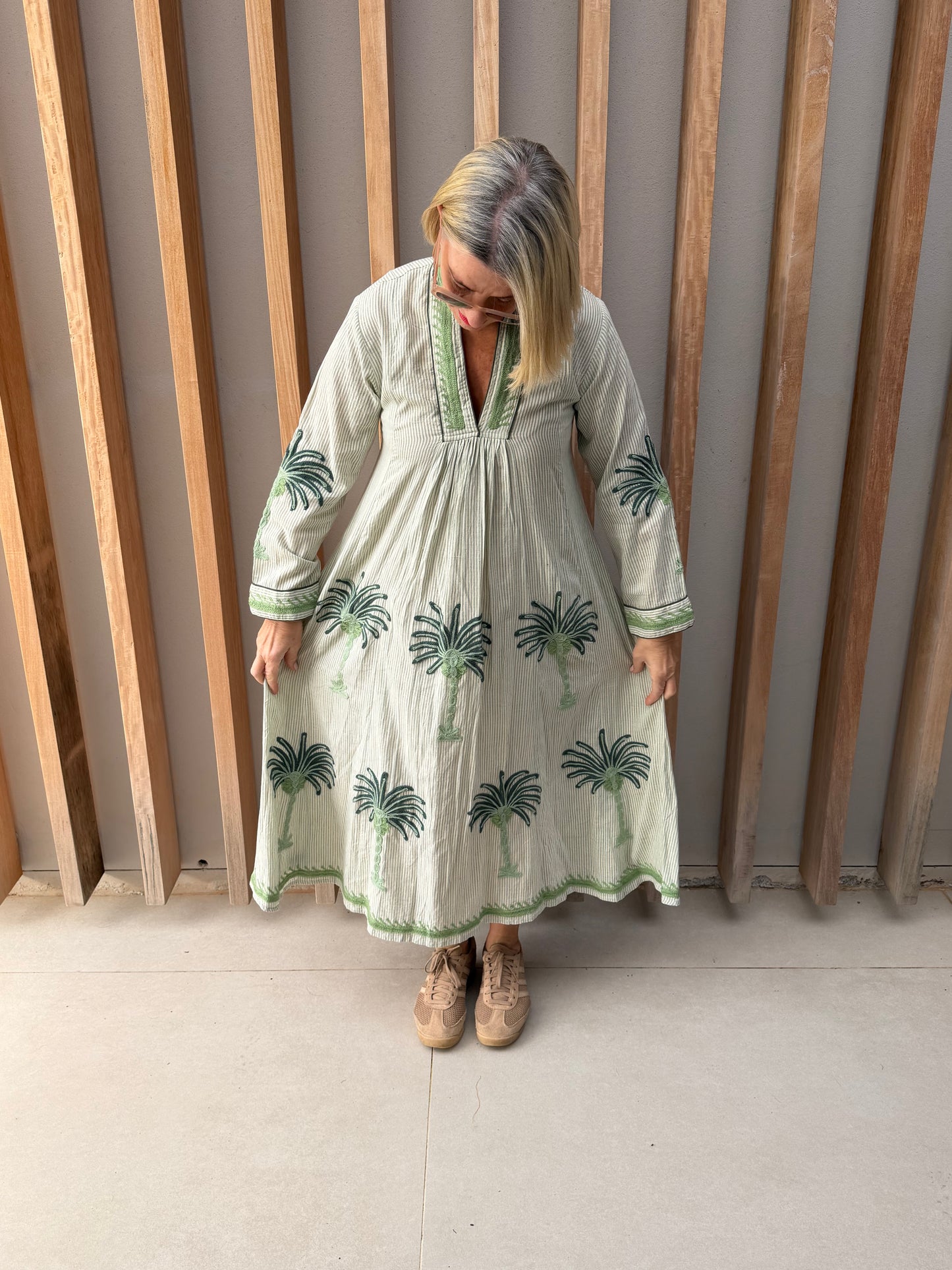 Apple green striped dress with embroidered palm
