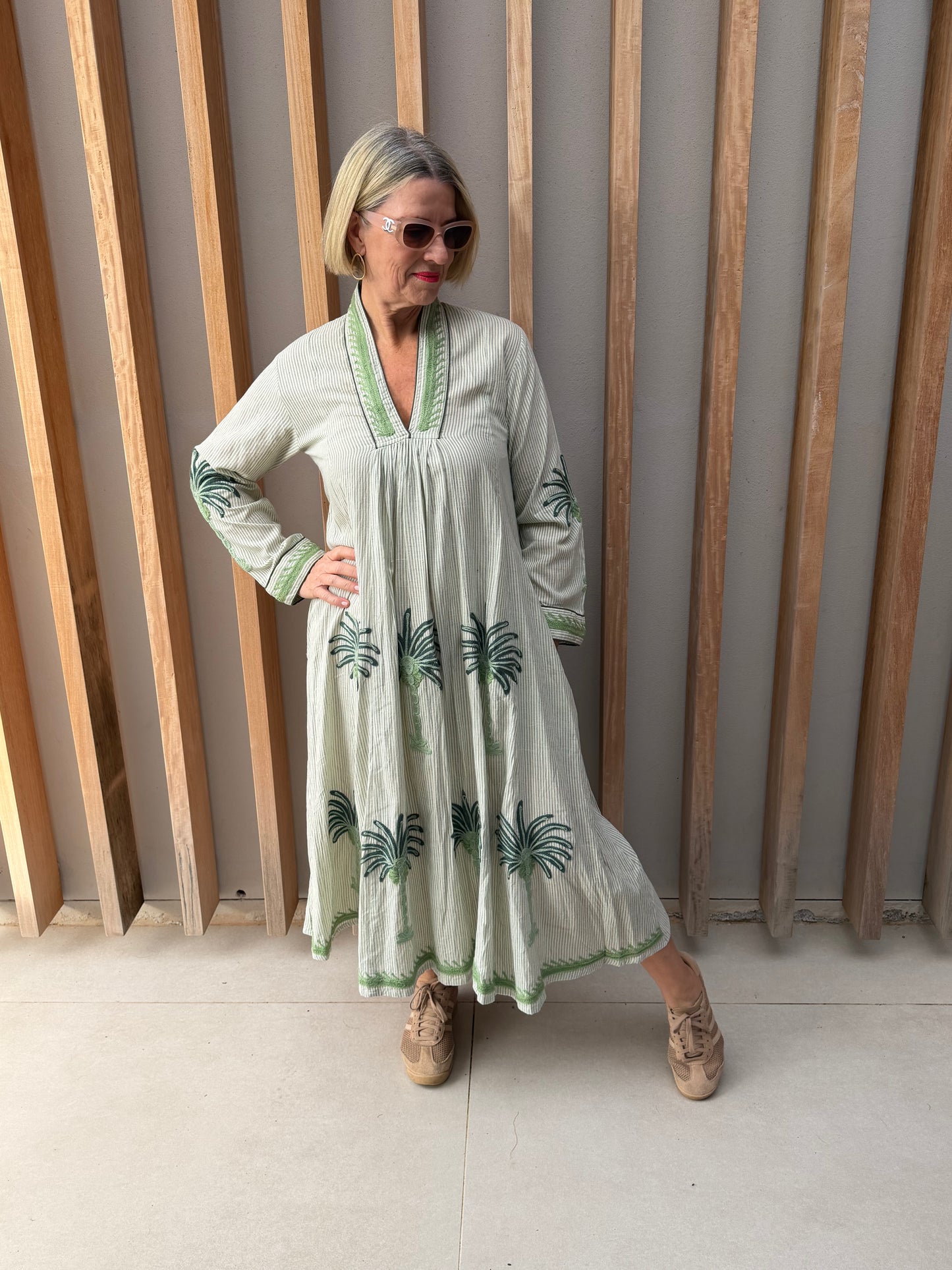 Apple green striped dress with embroidered palm