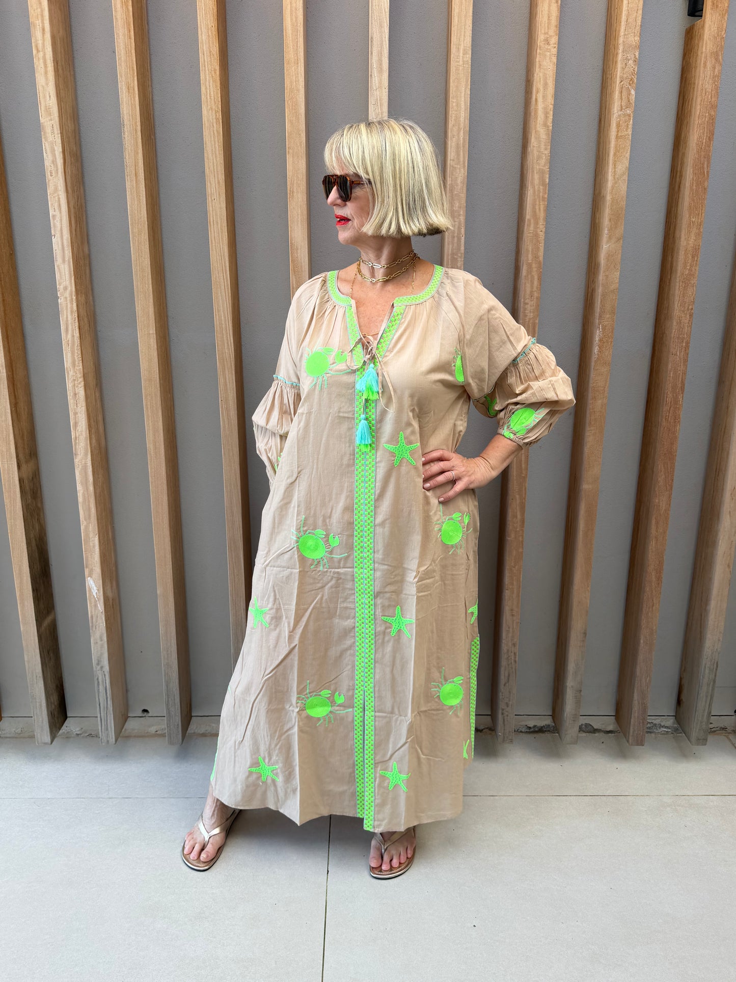 Beige embroidered dress