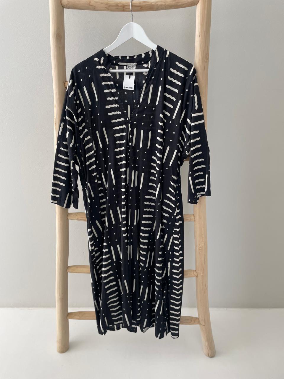 Black dress with cream dash dot pattern