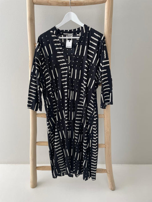 Black dress with cream dash dot pattern