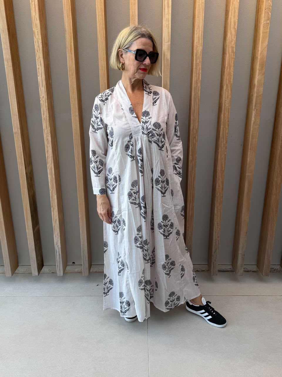 White dress with black daisy floral pattern