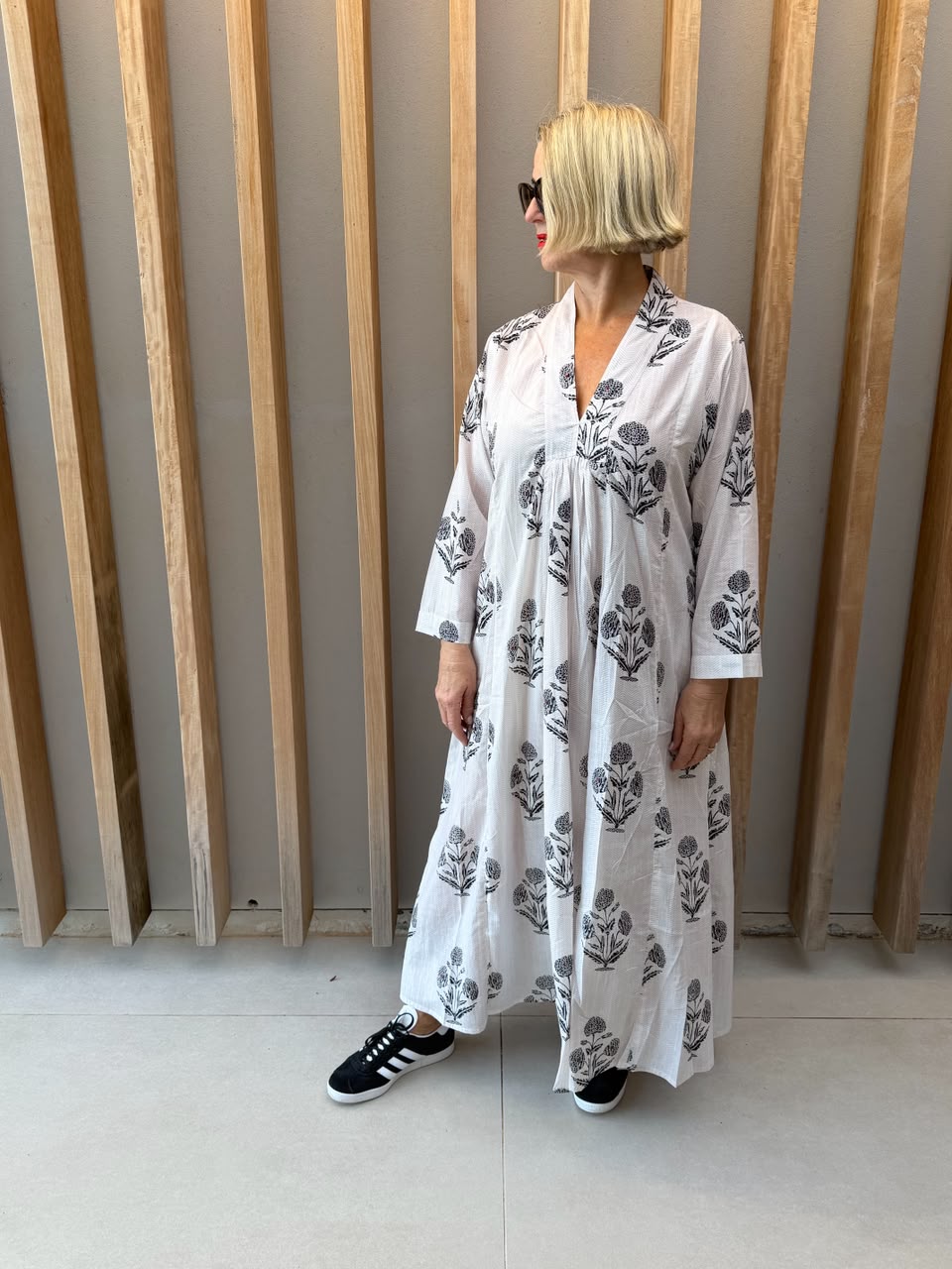 White dress with black daisy floral pattern
