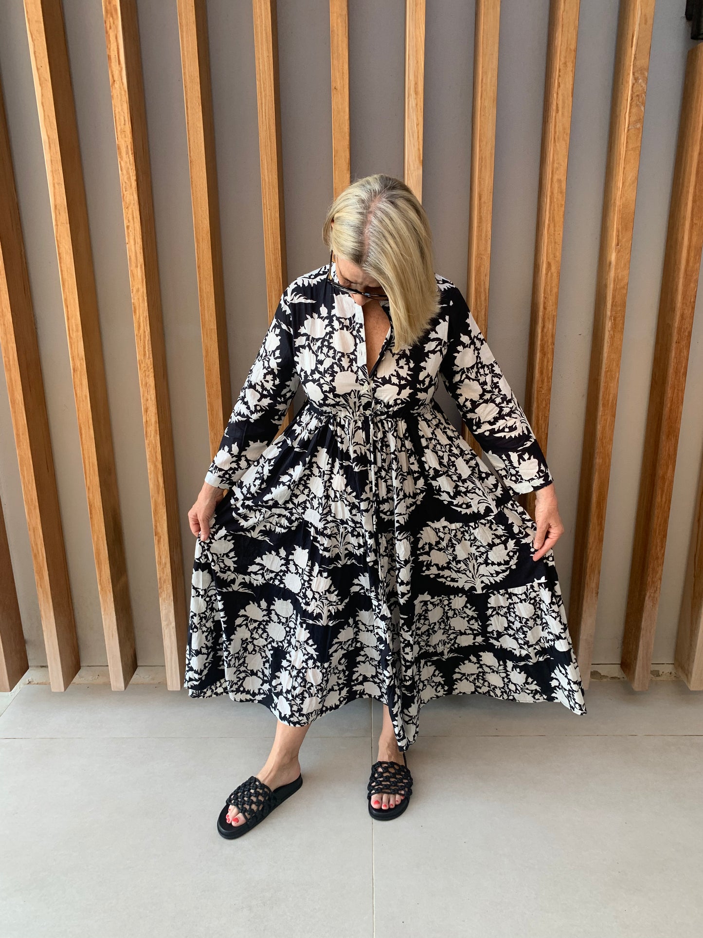 Black button-up dress with white floral pattern
