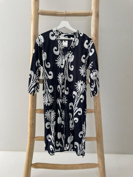 Black dress with white flower