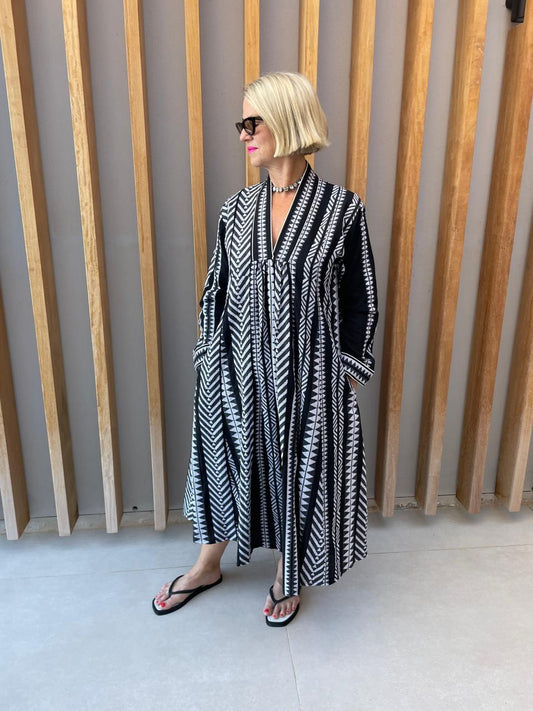 Black dress with white fishbone geometric design