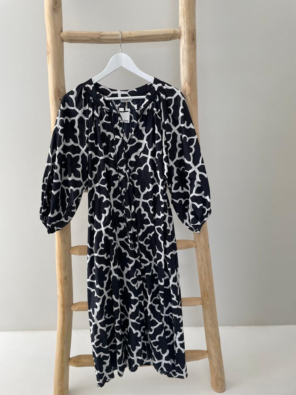 Black dress with white pattern puffy sleeves