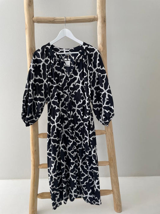 Black dress with white pattern puffy sleeves