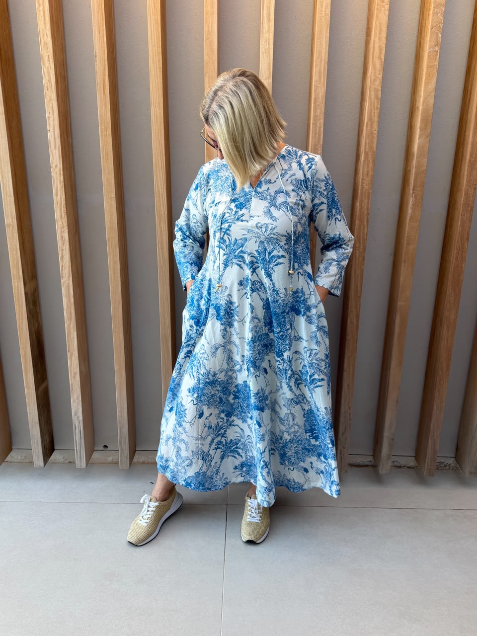 White dress with blue animal palm pattern