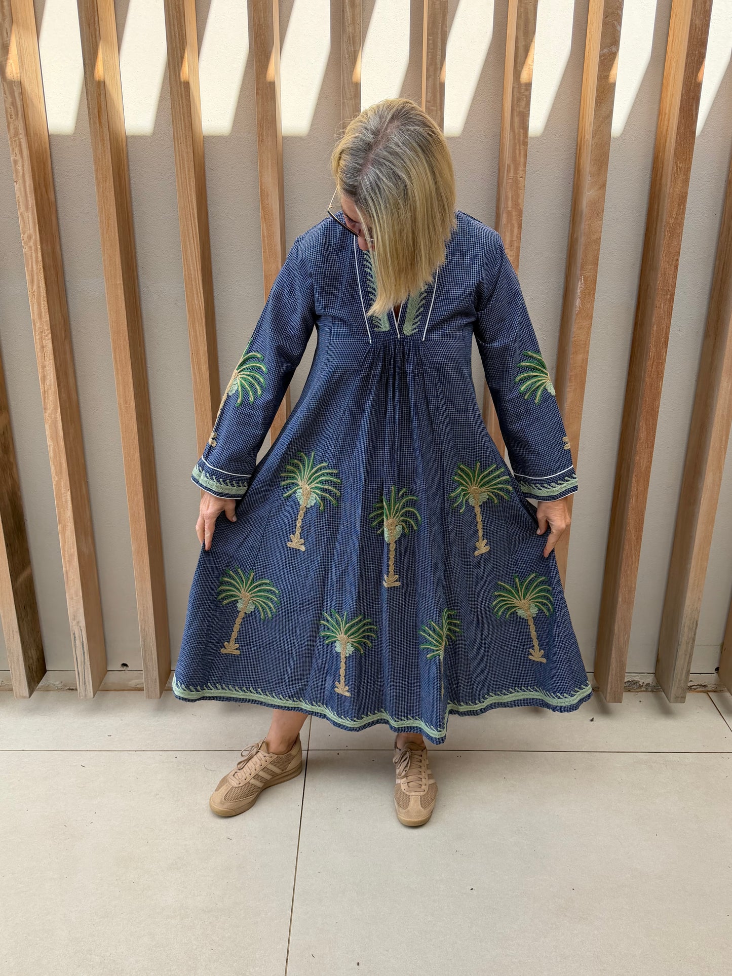 Blue check dress with embroidered green palm