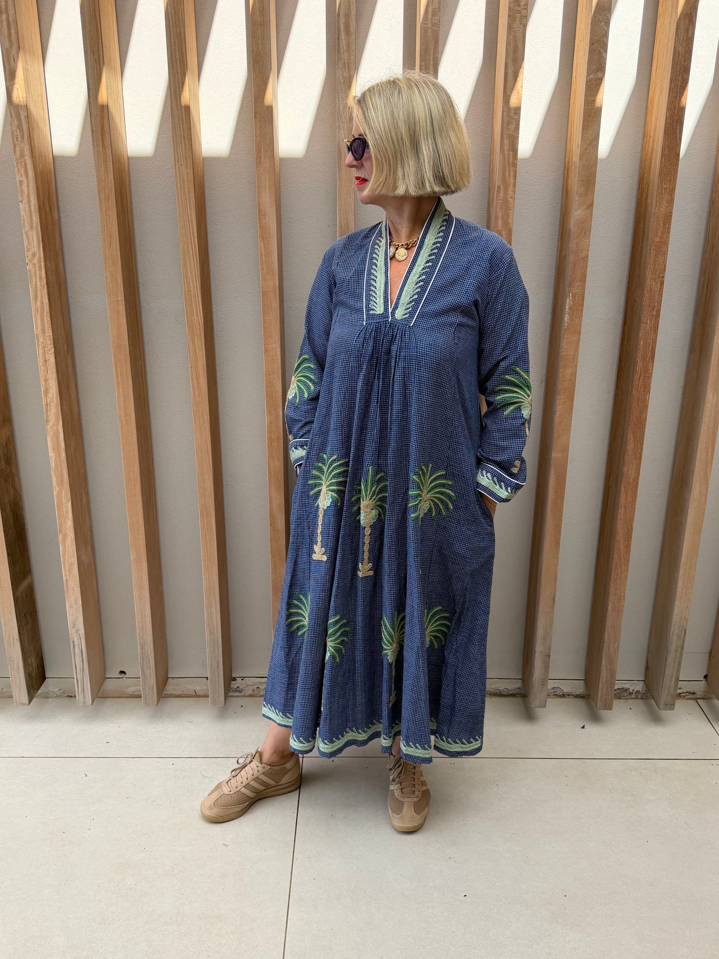 Blue check dress with embroidered green palm