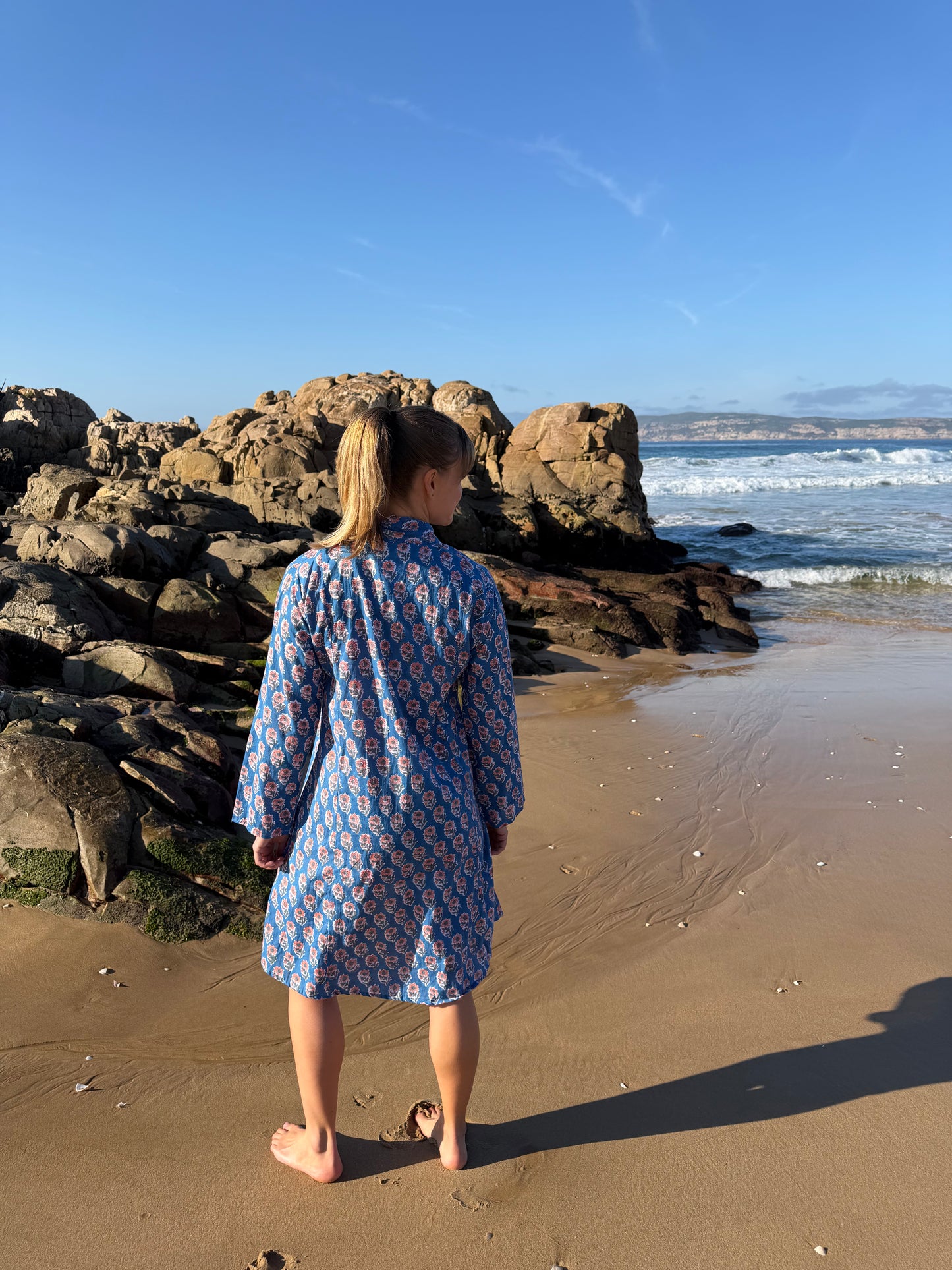 Blue dress with pink floral pattern
