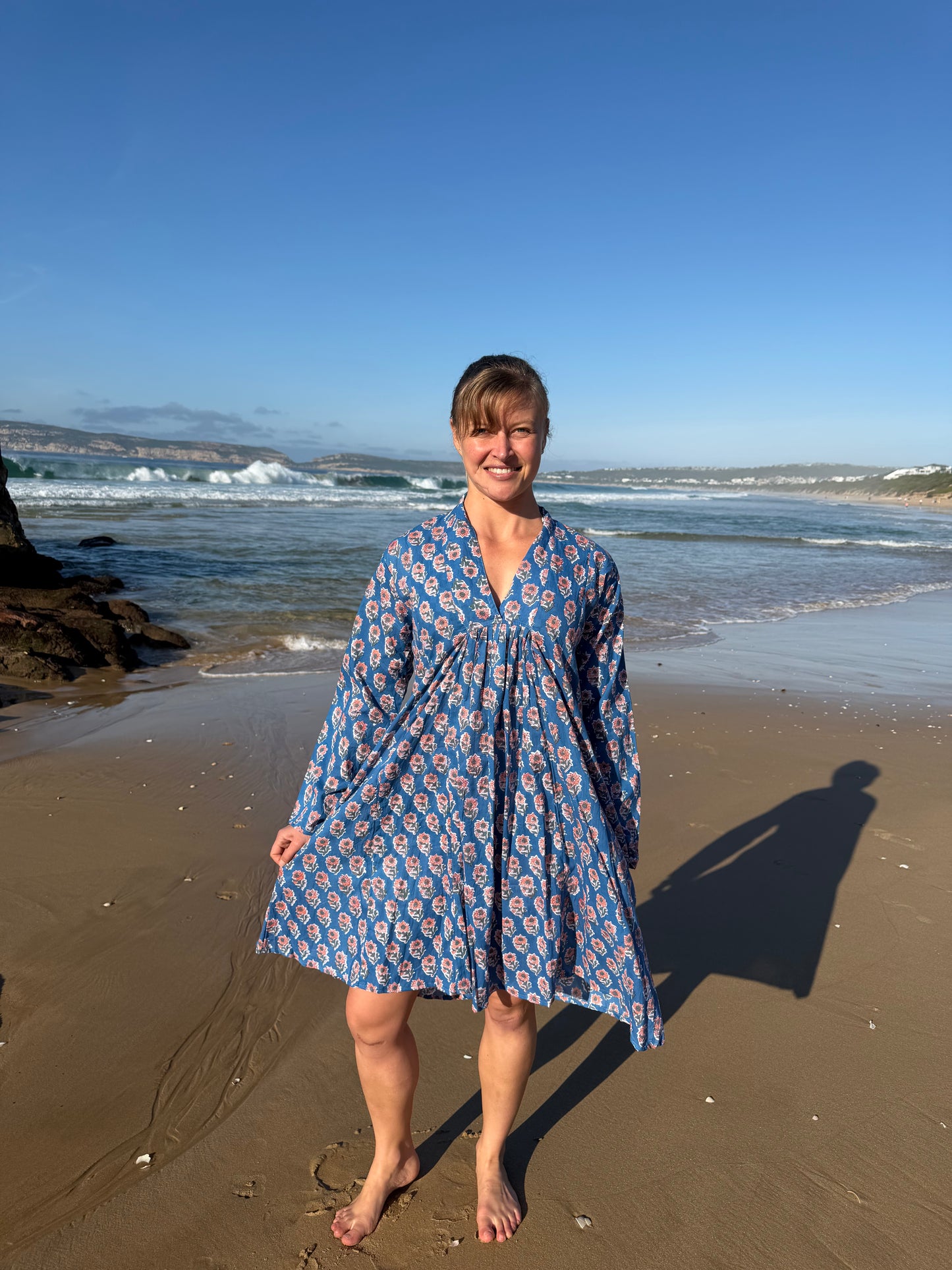 Blue dress with pink floral pattern
