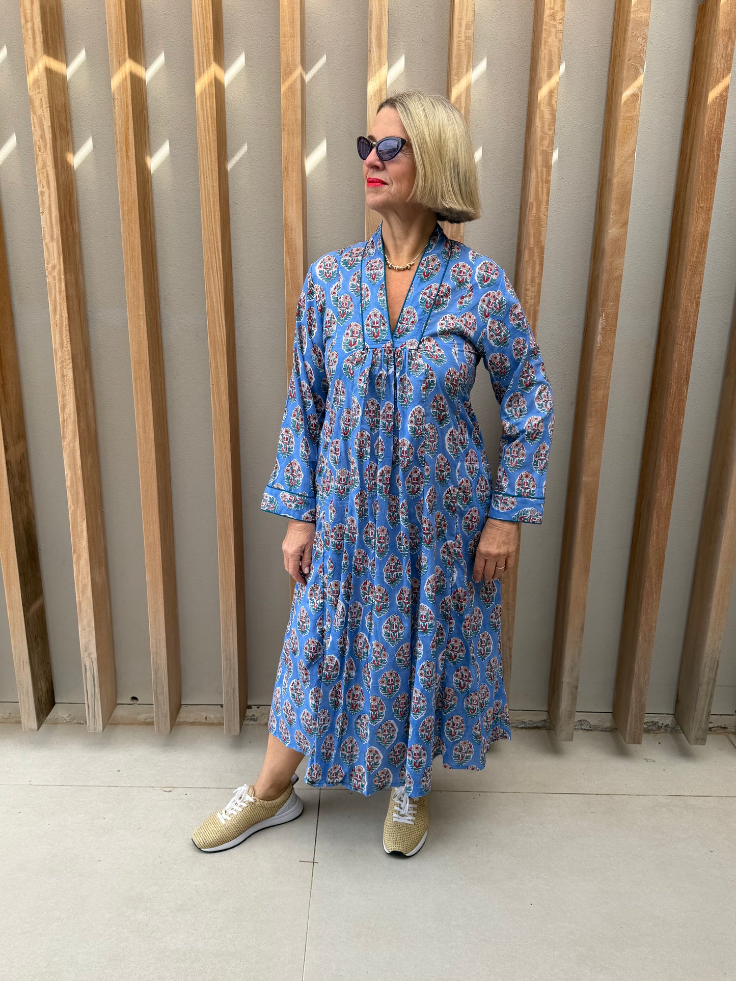 Blue dress with red & green floral pattern