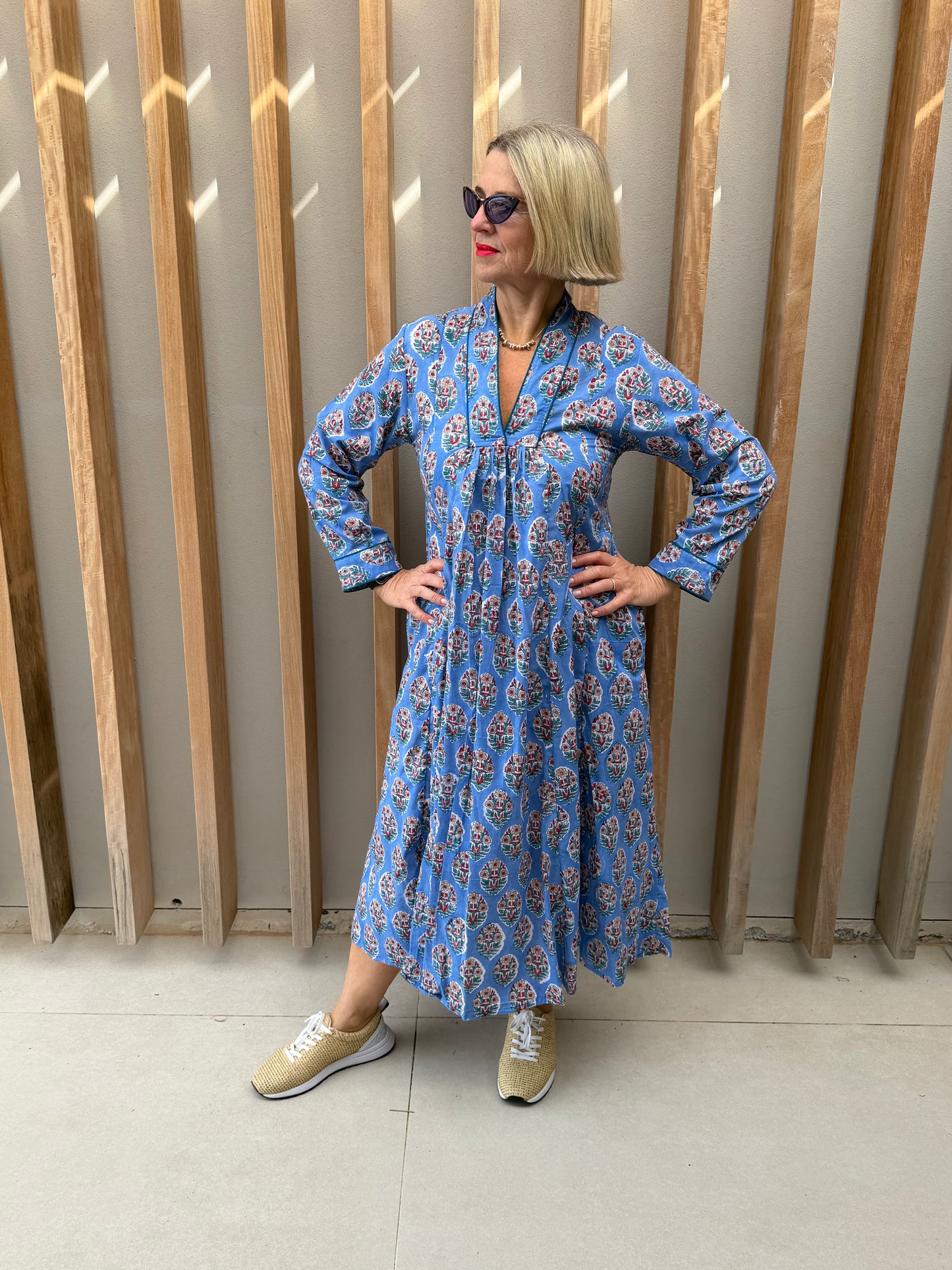Blue dress with red & green floral pattern
