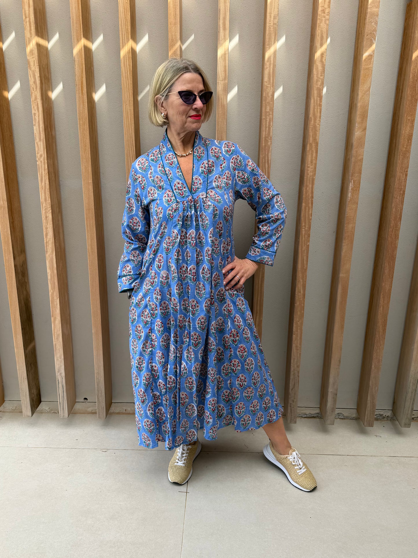 Blue dress with red & green floral pattern