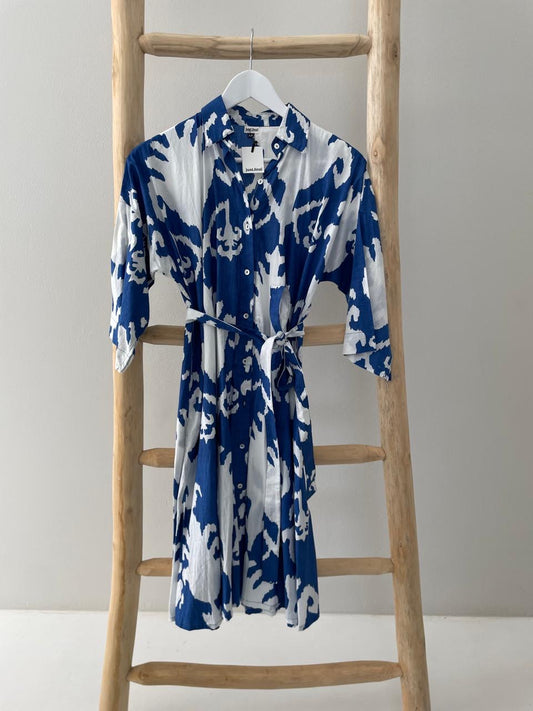 Blue dress with white floral pattern collar