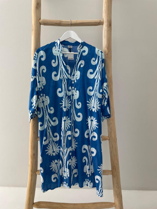 Blue dress with white flower