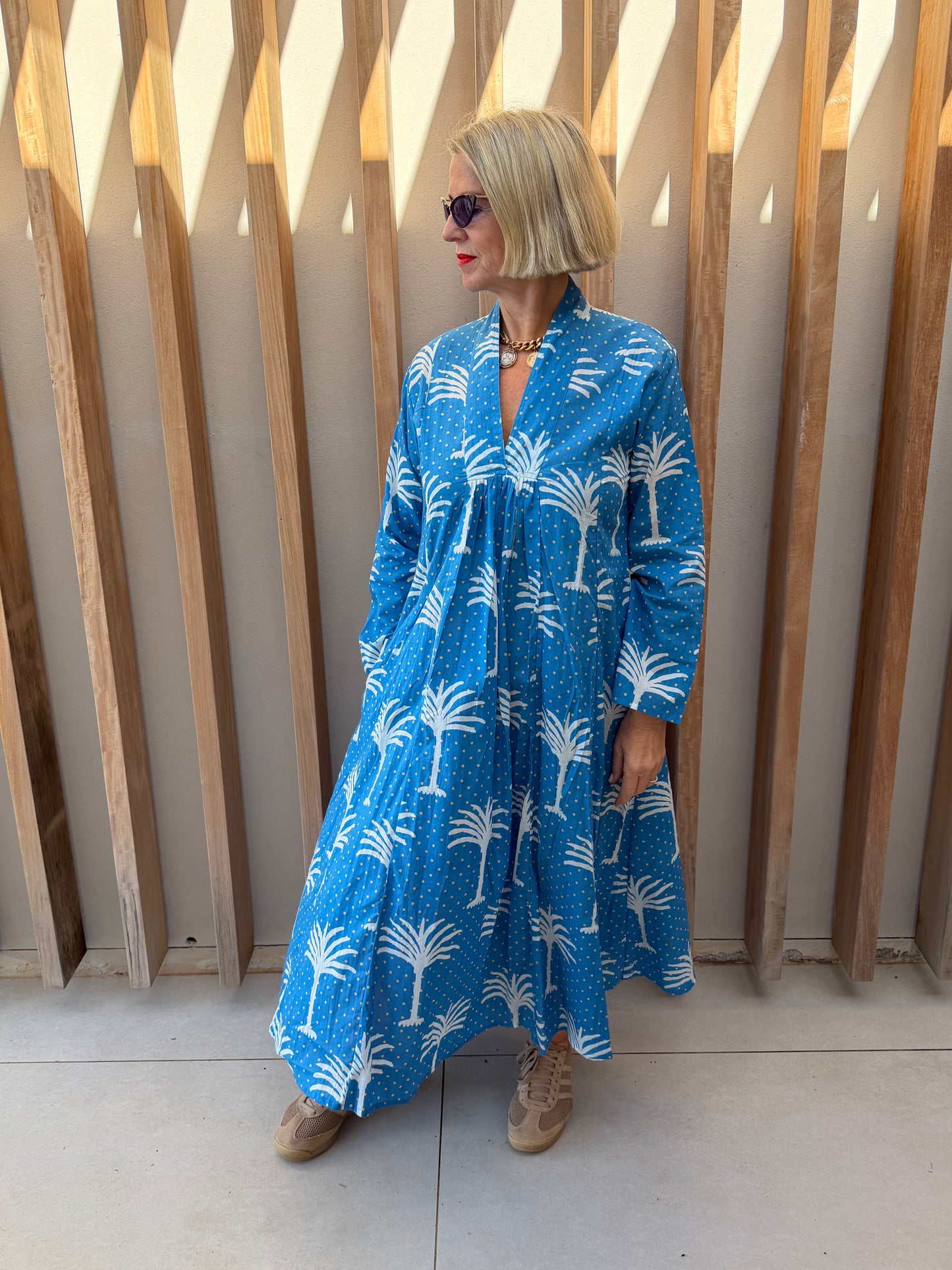 Blue dress with white palm pattern