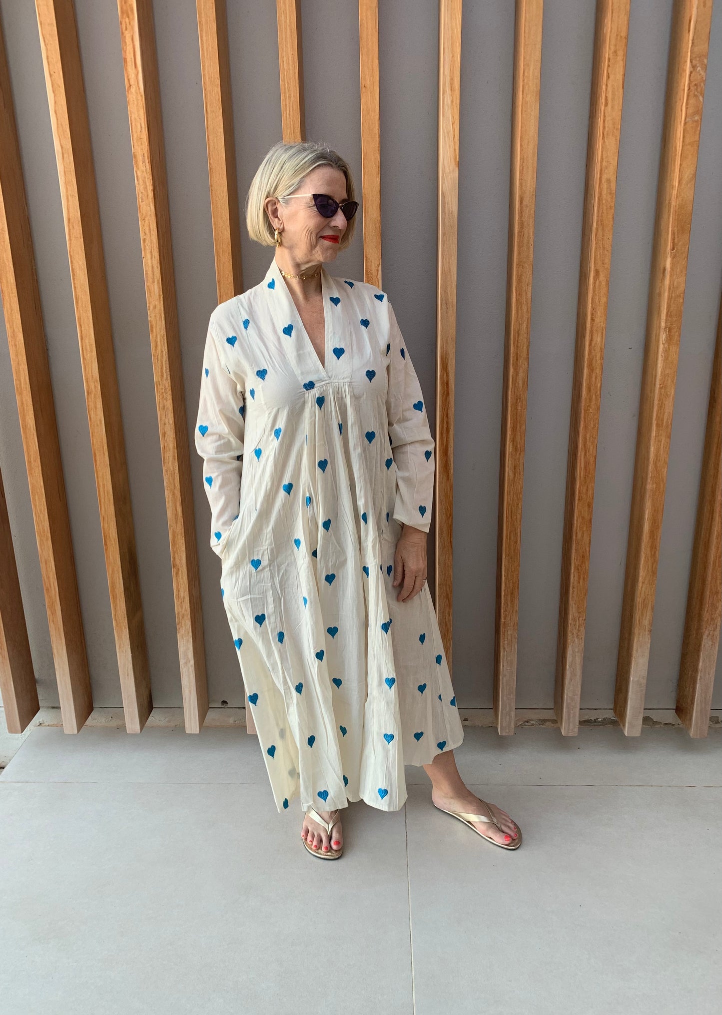 Cream dress with blue embroidered heart