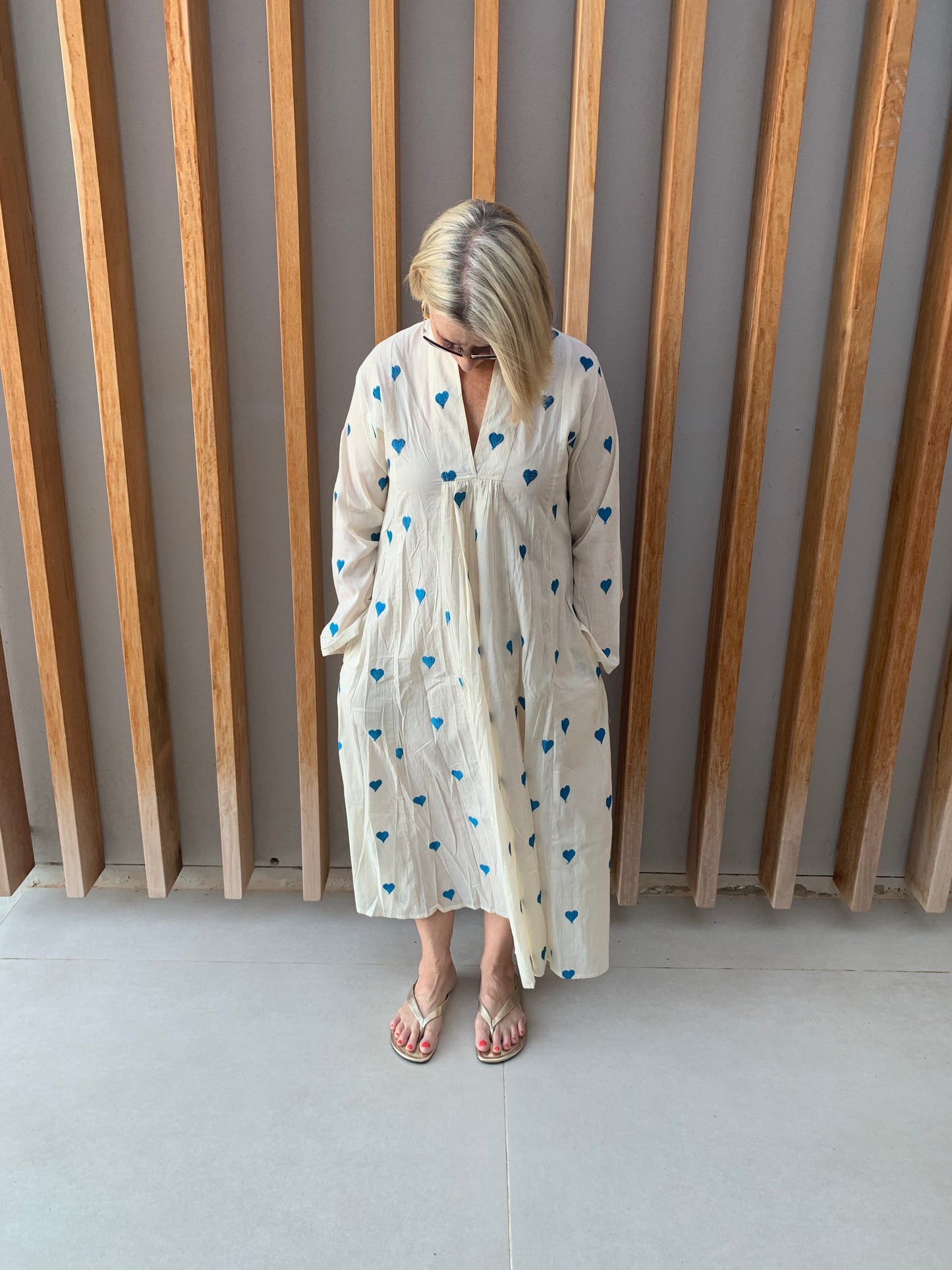 Cream dress with blue embroidered heart