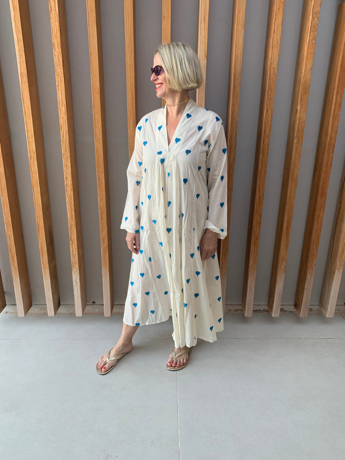 Cream dress with blue embroidered heart