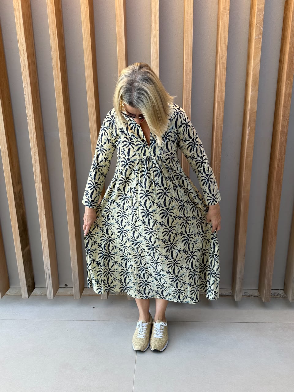 Cream dress with navy palm pattern
