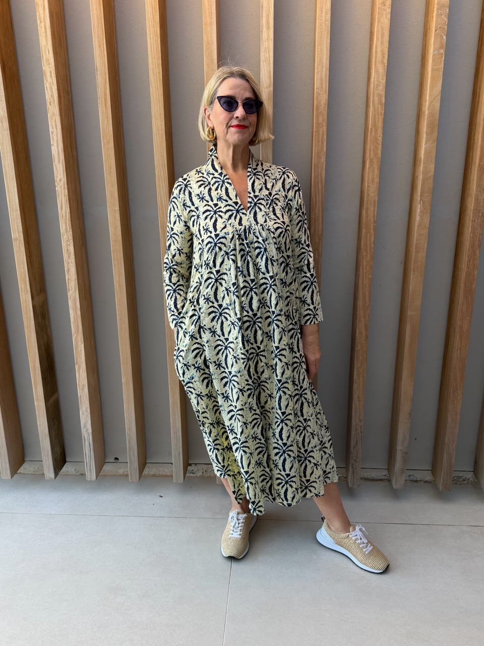 Cream dress with navy palm pattern