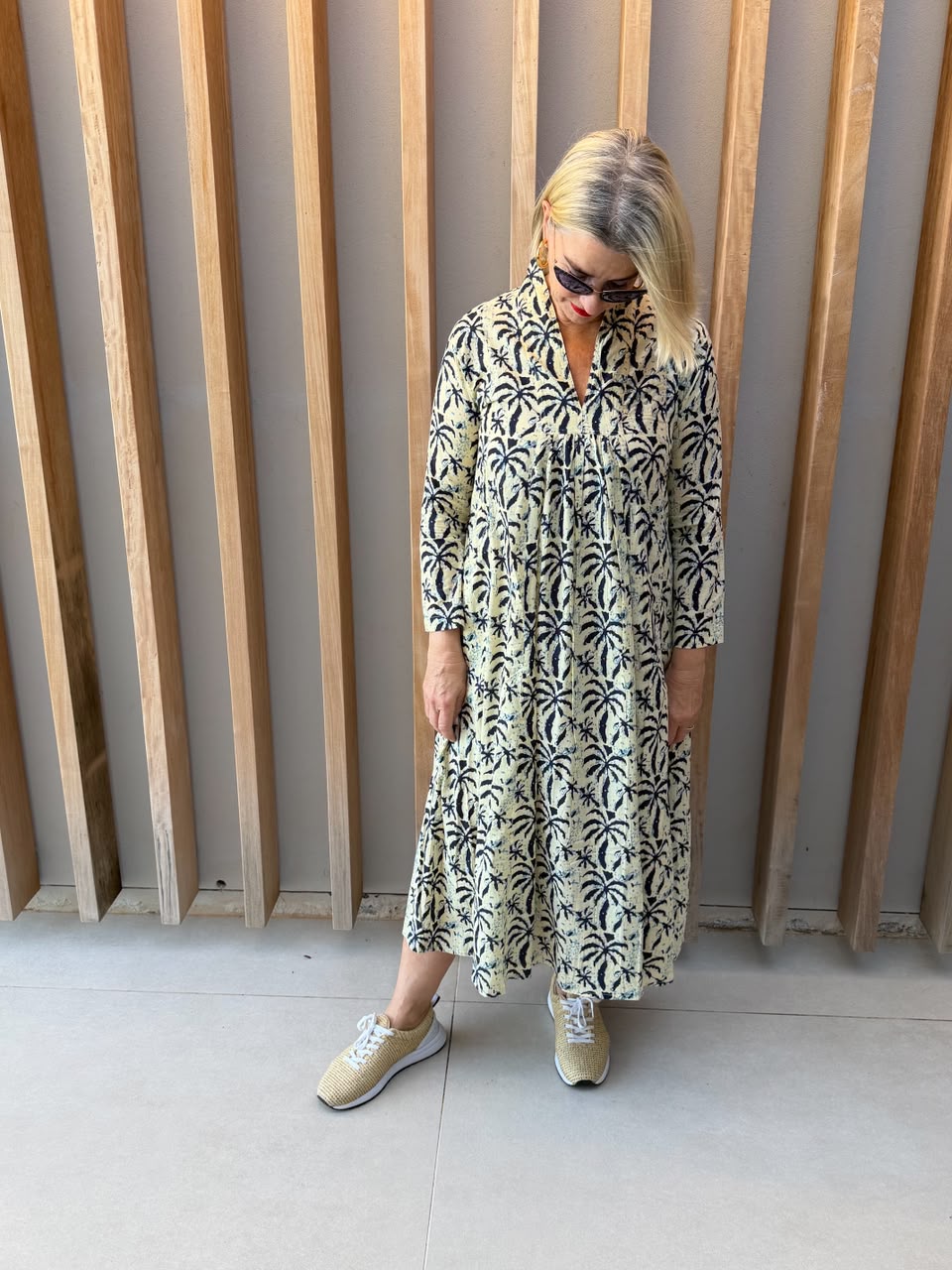 Cream dress with navy palm pattern