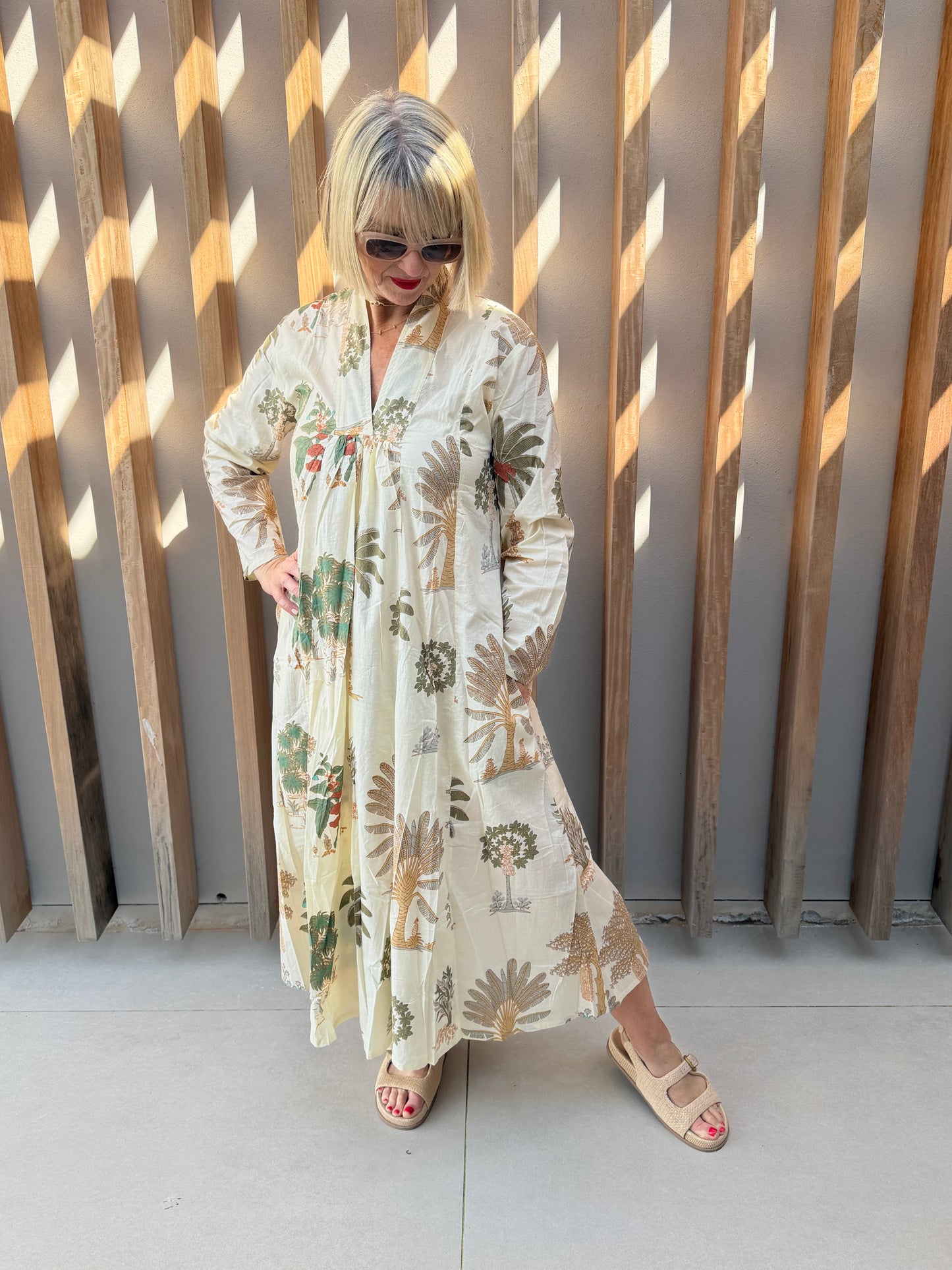 Cream dress with palm pattern